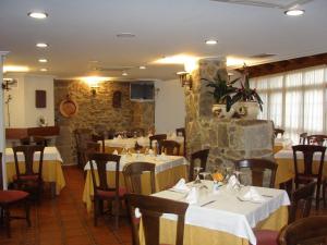 Reštaurácia alebo iné gastronomické zariadenie v ubytovaní Hotel Casa Alberto