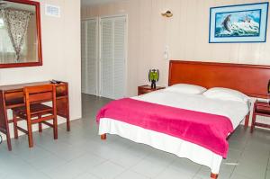 Postel nebo postele na pokoji v ubytování Hotel Nitana