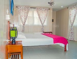 Postel nebo postele na pokoji v ubytování Hotel Nitana
