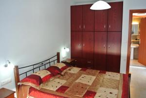 Postel nebo postele na pokoji v ubytování APARTMENTS kokalaki