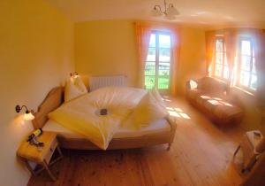 Postel nebo postele na pokoji v ubytování Weingut Winzerhof Gästezimmer Grebenz