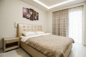 Llit o llits en una habitació de Amazing apartment in the center of Kiev