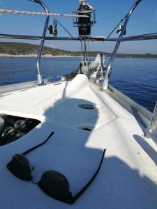 a view of the front of a boat on the water at Buena Vis-ta Apartments with the Sea View in Vis