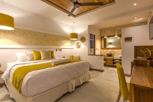 Voodi või voodid majutusasutuse Umami Hotel - Adults Only toas
