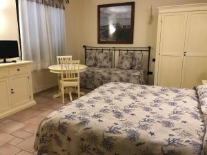 Łóżko lub łóżka w pokoju w obiekcie Hotel Villa Del Parco
