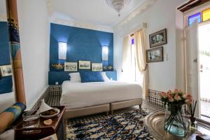 Postel nebo postele na pokoji v ubytování Riad Emotion + 37 fotografií