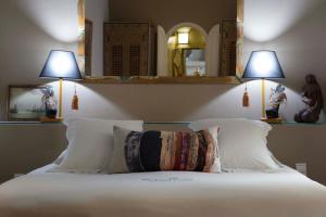 Ein Bett oder Betten in einem Zimmer der Unterkunft Riad Emotion