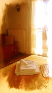 Postel nebo postele na pokoji v ubytování Guesthouse Gouris