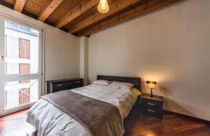 Una cama o camas en una habitación de CA' DEI SCORZERI