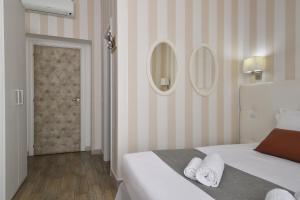 Cama o camas de una habitación en Rome Vatican Inn