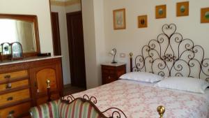 A bed or beds in a room at B&B L' Antica Fonte