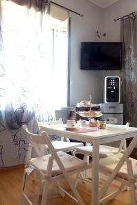 TV a/nebo společenská místnost v ubytování B&B Caffelletto - Papardo