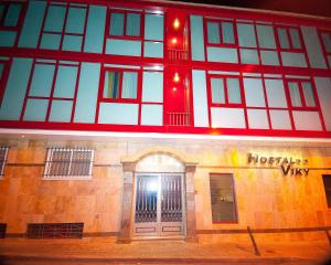 a building with a door on the side of it at Hostal Viky in Madrid