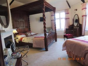 Cama o camas de una habitación en Orchard House Hotel