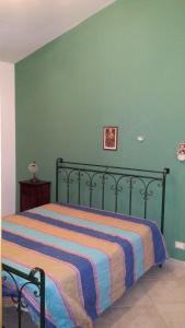 Postel nebo postele na pokoji v ubytování Villa a San Vito lo Capo Minaudo