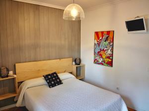 Postel nebo postele na pokoji v ubytování Hostal Alcántara