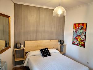 Postel nebo postele na pokoji v ubytování Hostal Alcántara