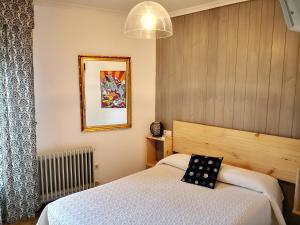 Postel nebo postele na pokoji v ubytování Hostal Alcántara