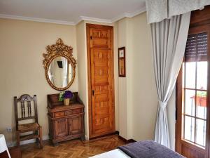 Postel nebo postele na pokoji v ubytování Hostal Alcántara