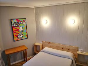 Postel nebo postele na pokoji v ubytování Hostal Alcántara