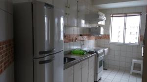 Köök või kööginurk majutusasutuses Privé das Thermas Caldas Novas