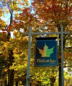 a sign for a piercebush inn with trees in the background at Benjamin Prescott Inn in Jaffrey
