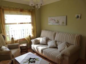 Ein Sitzbereich in der Unterkunft Appartement Punta Almina 100 m from t h e sea