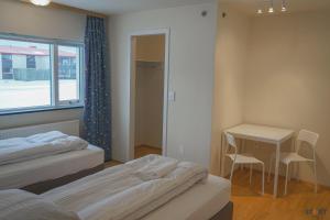 Tempat tidur dalam kamar di Start Keflavík Airport