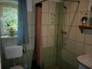 Kúpeľňa v ubytovaní Gosciniec Pod Debem