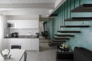 Η κουζίνα ή μικρή κουζίνα στο Casa Boscolo Luxury