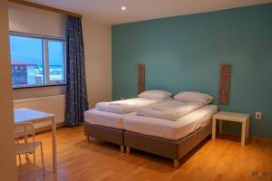 Tempat tidur dalam kamar di Start Keflavík Airport