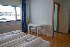 Tempat tidur dalam kamar di Start Keflavík Airport