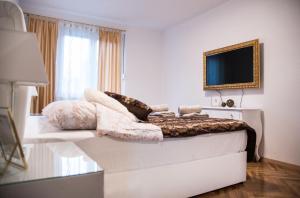 Posteľ alebo postele v izbe v ubytovaní Đeni luxury apartment