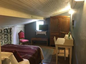 Ένα ή περισσότερα κρεβάτια σε δωμάτιο στο Casa Tiradentes - apto 3