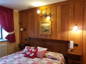 Letto o letti in una camera di L'Ancien Paquier Chambre D'Hotes