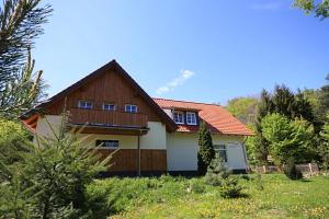 a house with a brown and white at Wanderlust in Ilsenburg