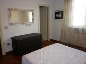 Giường trong phòng chung tại Deliziosa Villetta
