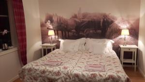 
Ein Bett oder Betten in einem Zimmer der Unterkunft Kullens Bed and Breakfast
