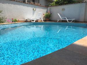 Der Swimmingpool an oder in der Nähe von Villa Diana