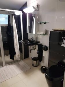 a bathroom with a sink and a toilet at Apartment Dijana in Kaštela +22 photos