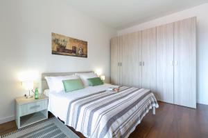 Postel nebo postele na pokoji v ubytování Spada Residence I