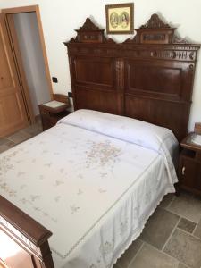 Ένα ή περισσότερα κρεβάτια σε δωμάτιο στο Casa Luigina