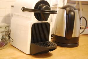 a coffee maker sitting on top of a counter at T1Bis centre d'Arcachon avec balcon in Arcachon