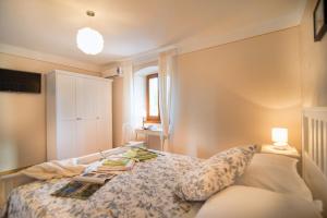 Postel nebo postele na pokoji v ubytování House nona Roza