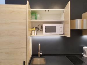 A kitchen or kitchenette at Beach & Center Premiun
