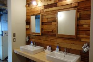 Ванна кімната в Tomarotto Hostel