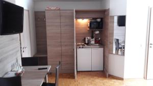 Kuchyň nebo kuchyňský kout v ubytování Gästehaus Zwischenberger