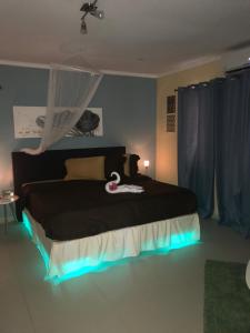 Postel nebo postele na pokoji v ubytování Malika Apartments