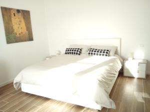 Säng eller sängar i ett rum på Bed and Breakfast Bio Salix