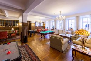 a large living room with a pool table in it at Historik Hotel Goldener Hirsch Rothenburg in Rothenburg ob der Tauber